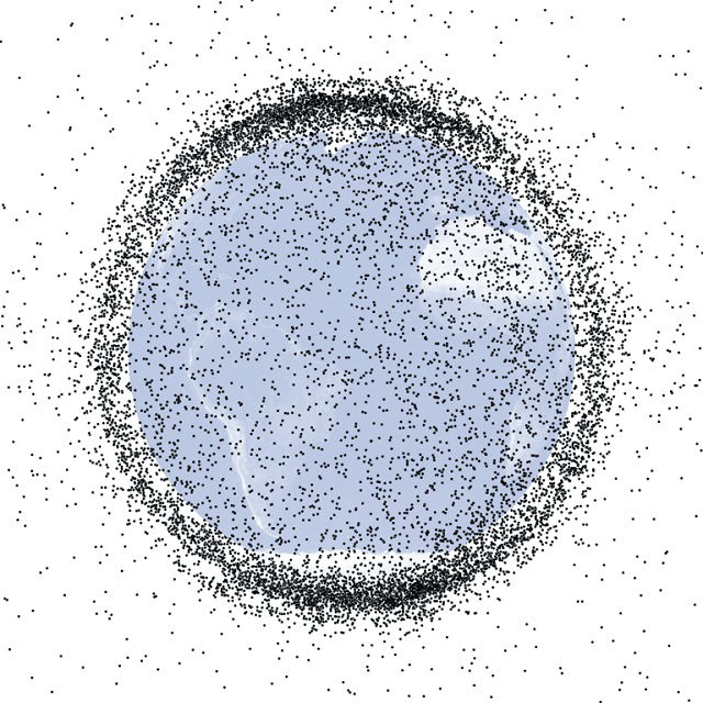 Компьютерная модель, иллюстрирующая облака космического мусора, кружащие по орбите Земли. Программа учла все космические обломки размером более 10 сантиметров (иллюстрация NASA).