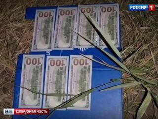 Киевский судья хранил крупную взятку в стеклянной банке